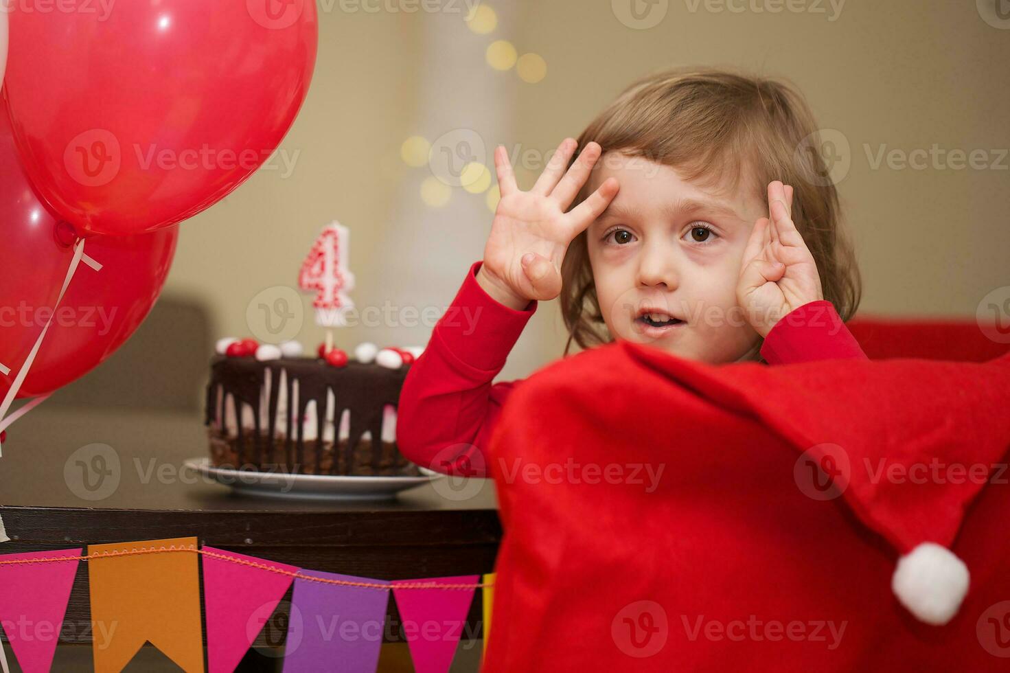 Boy of four years with birthday cake. photo