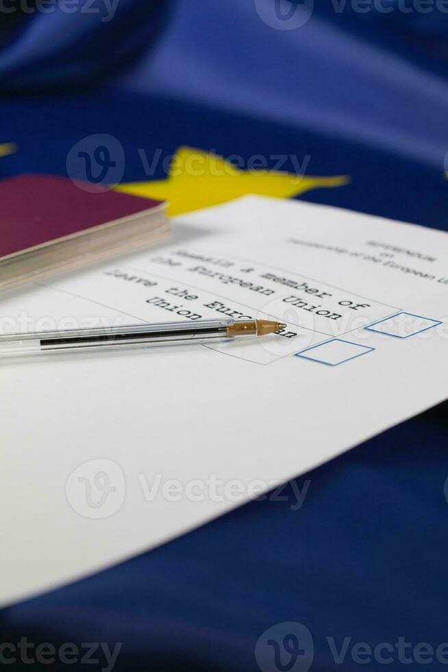 Black pen on an EU Referendum ballot paper. Passport in the background. photo