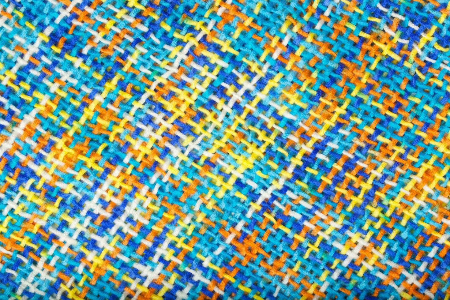 Colorful knitted surface. Closeup photo