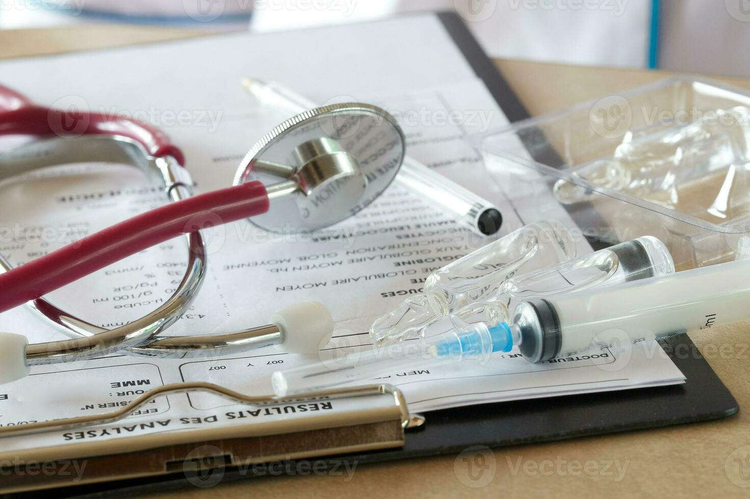 Ampules with antibiotics on a tables of a doctor photo