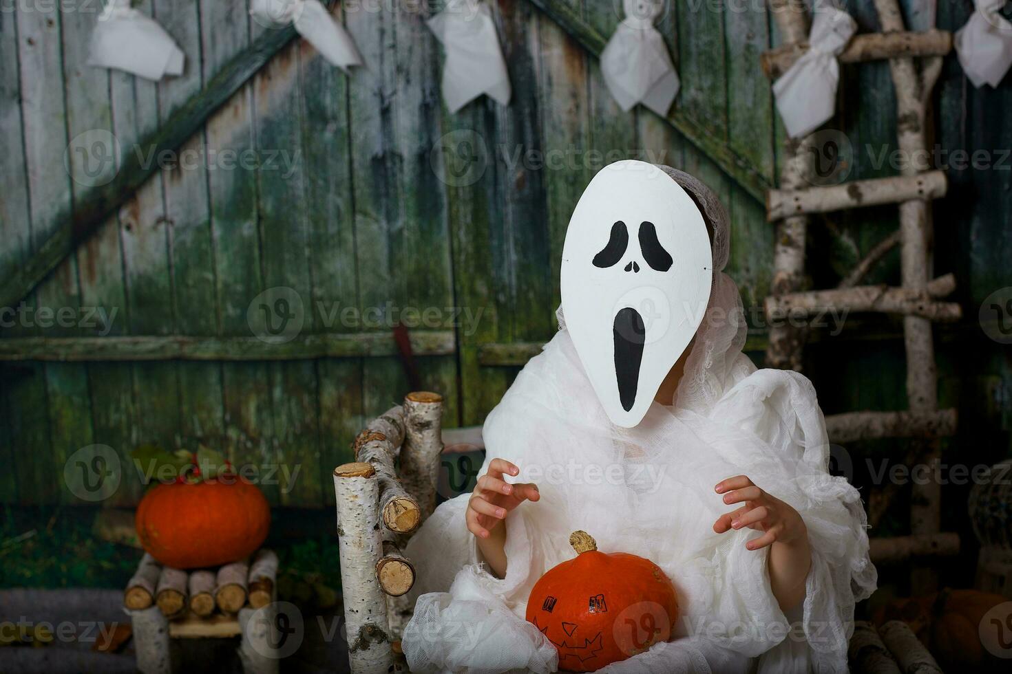 Boy of six years dressed in mummy costume. photo