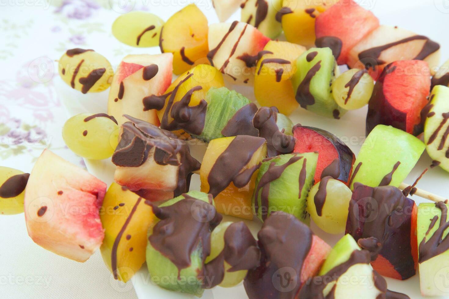 Fruit salad skewers photo