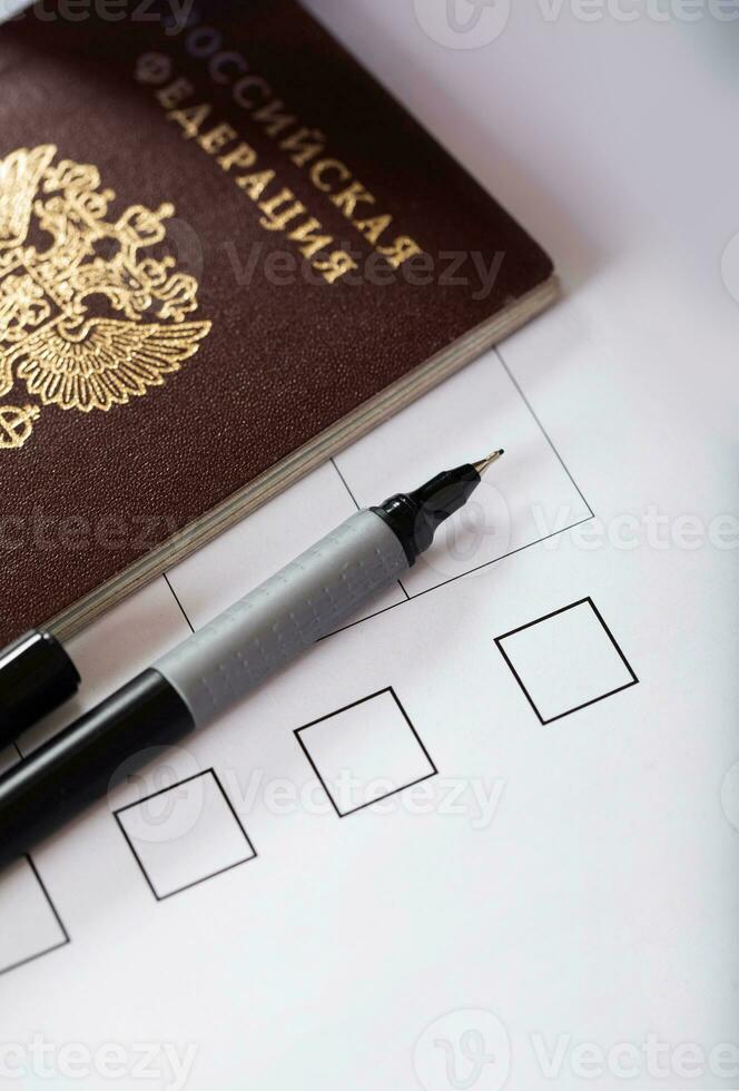 Black pen on ballot paper. photo