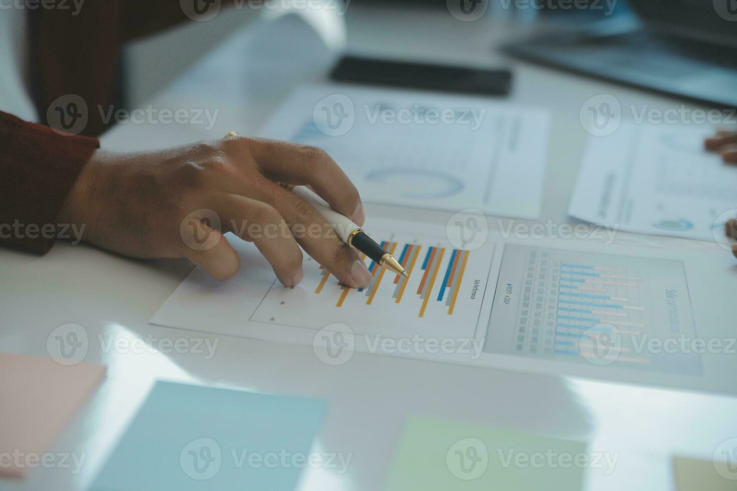 Team of business people are meeting to analyze data for marketing plan,Market research reports and income statistics, Financial and Accounting concept. photo