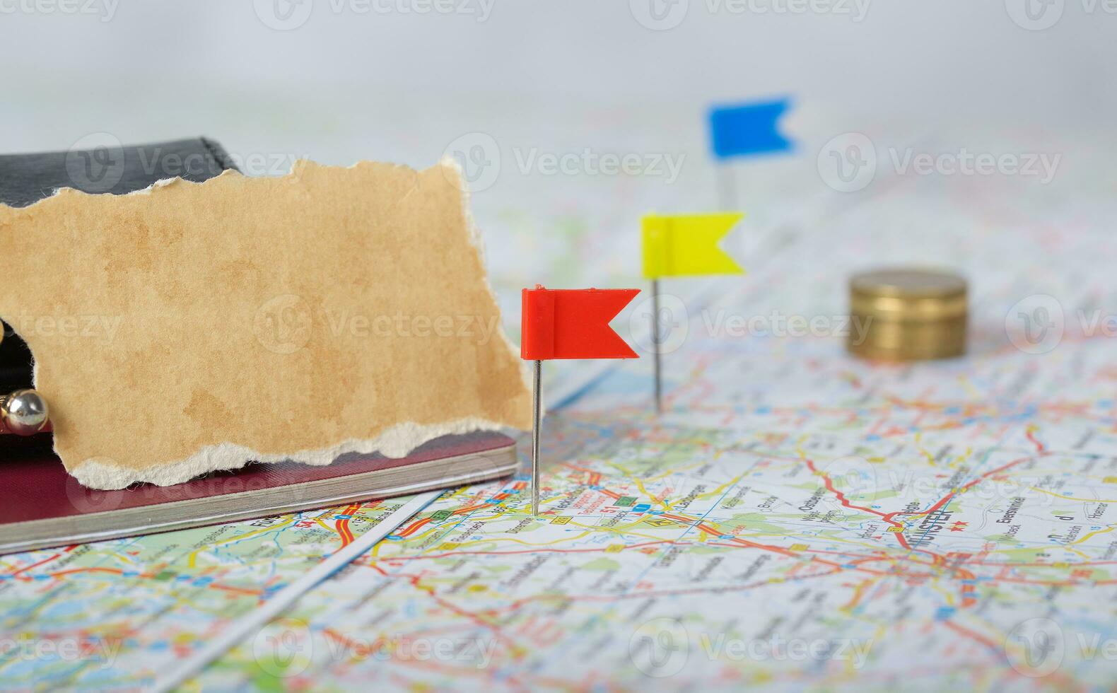 Wallet, coins, pass on a map. photo