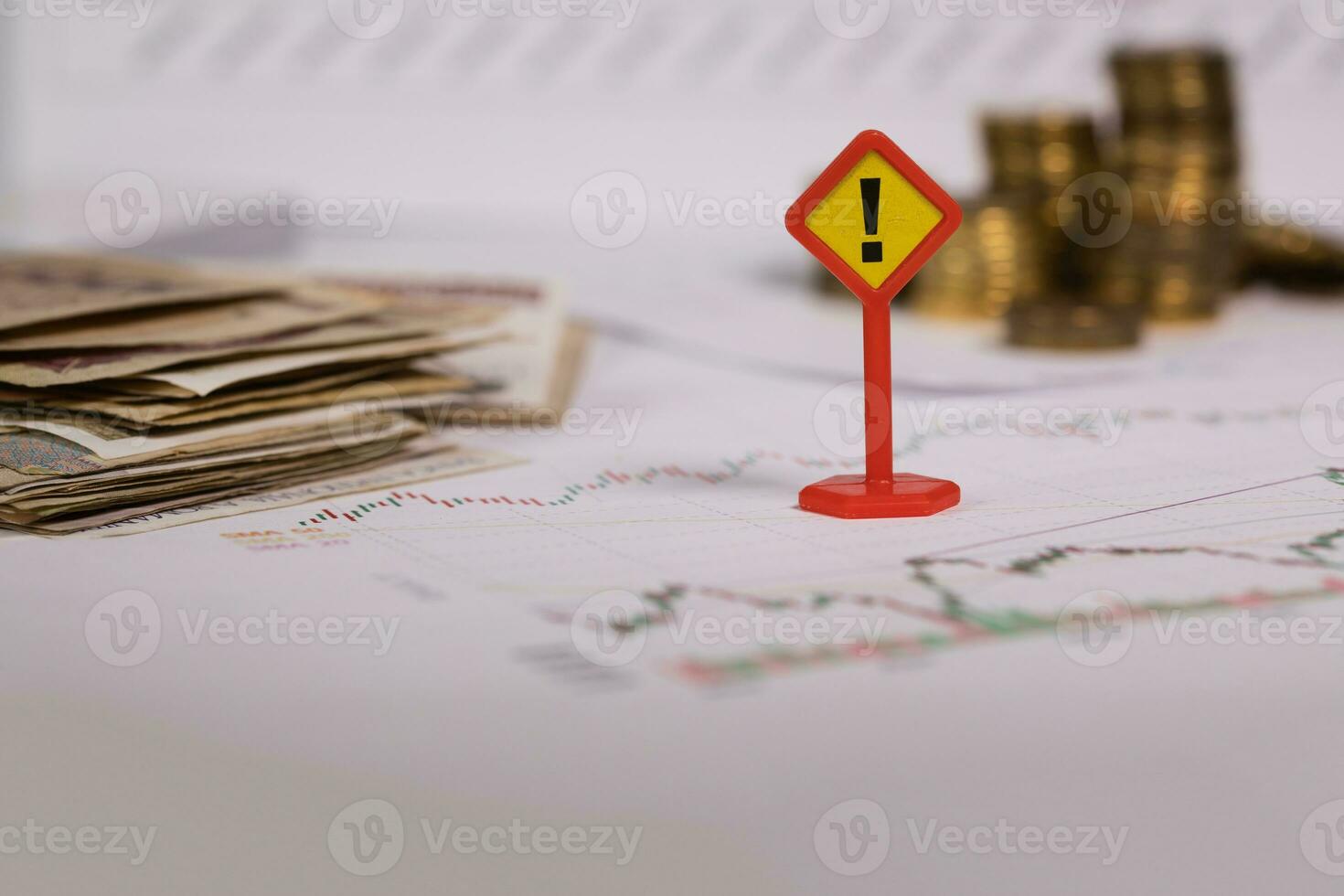Sign of exclamatory mark on a stock market diagram. photo
