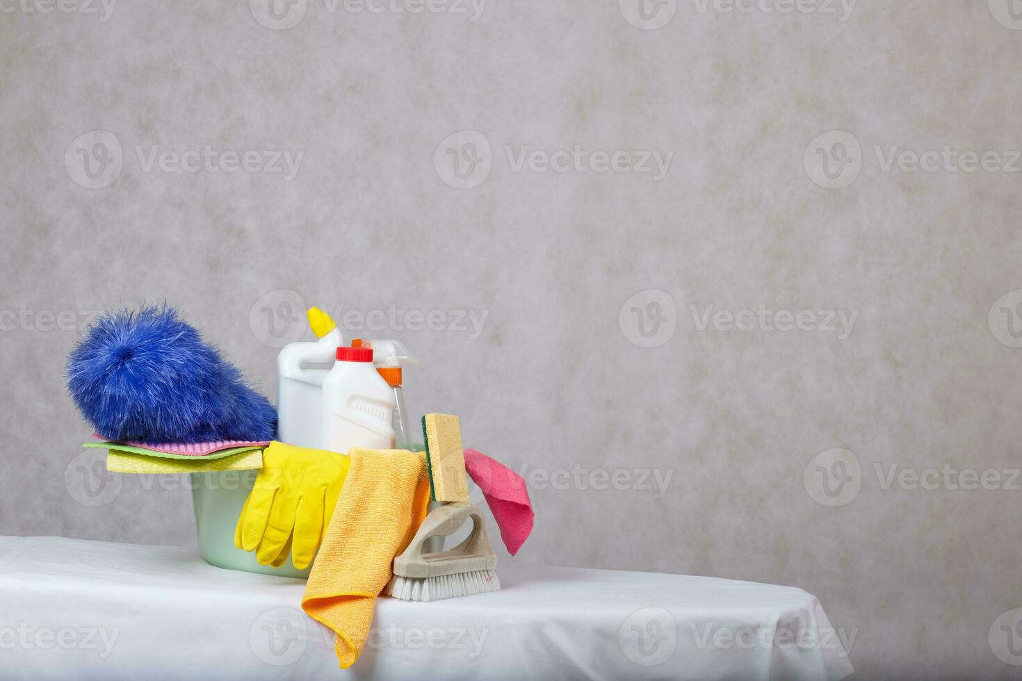 Cleaning products on a gray background. Closeup photo