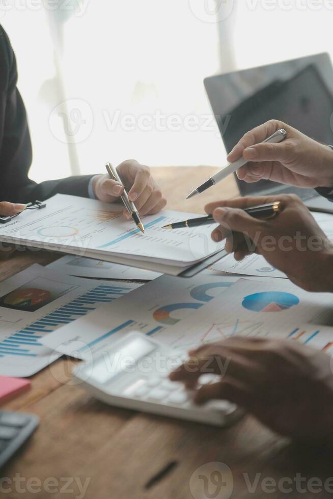 Team of business people working together in the meeting room office, teamwork background charts and graphs banner, double exposure successful teamwork,business planning concept. photo