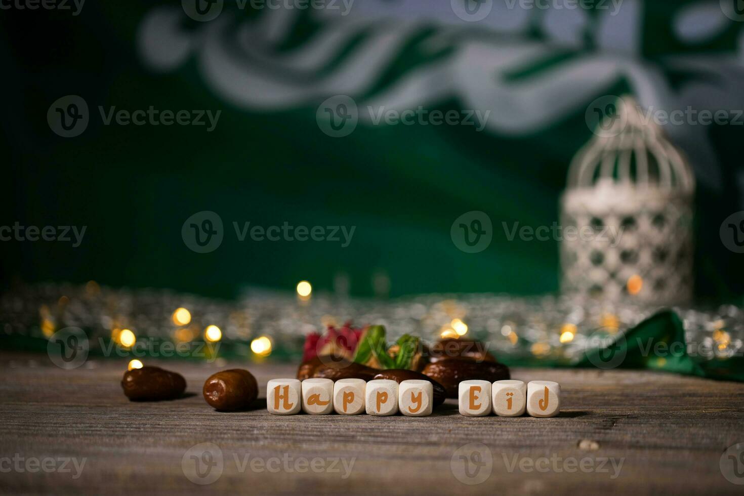 Congratulation HAPPY EID composed of wooden dices. photo