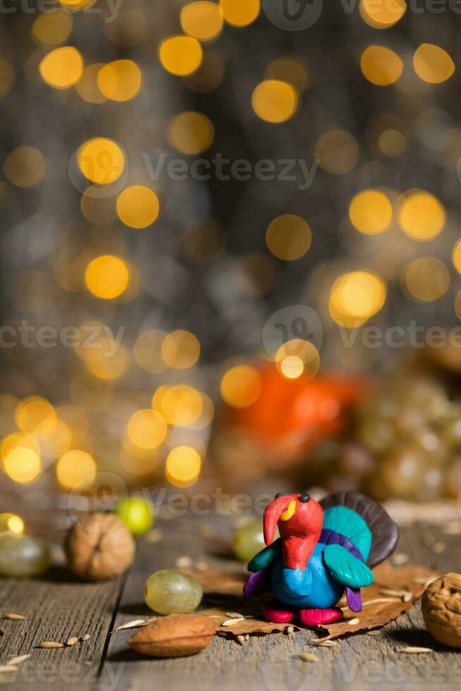 Handmade turkey on Thanksgiving background with blurred night lights. photo