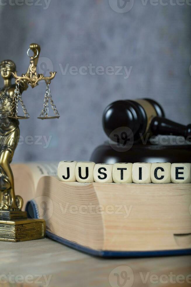 Word JUSTICE composed of wooden letters. photo