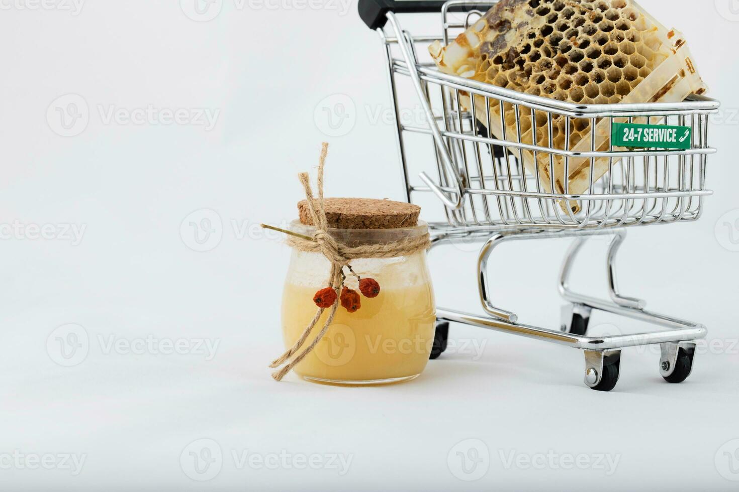 Honeycomb in a mini shopping cart. photo