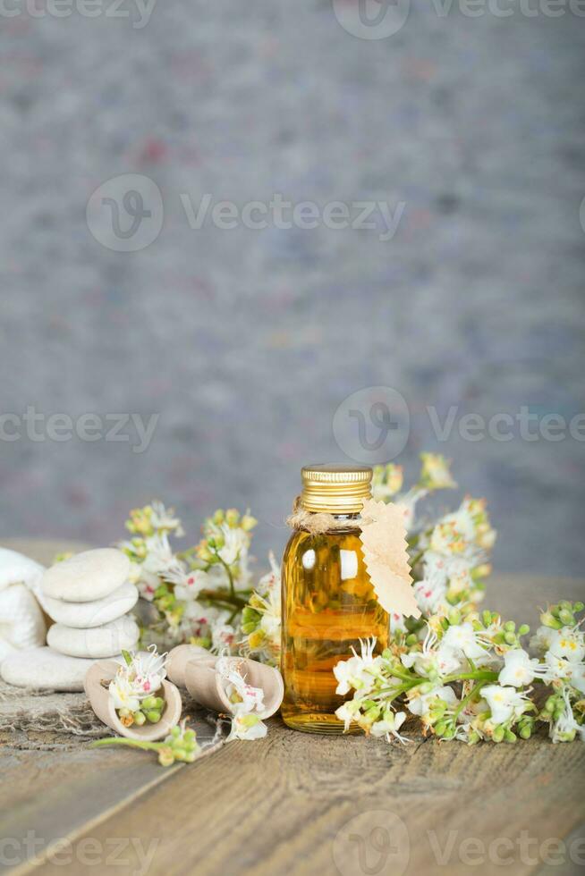 Glass bottle of horse chestnut oil extract. photo