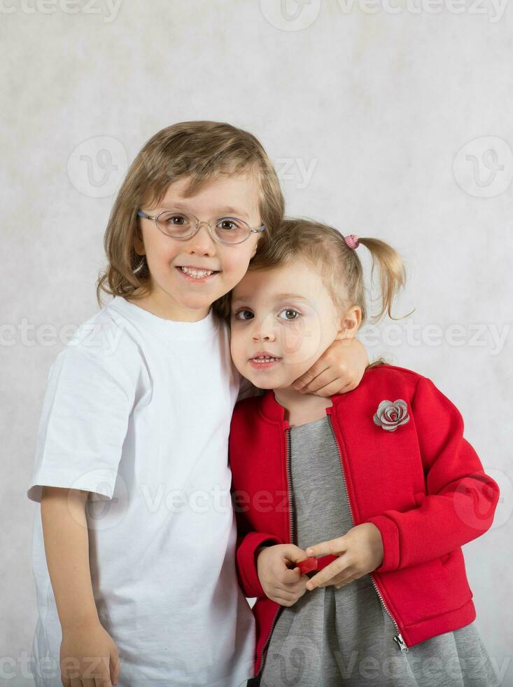 Boy of five years and girl of 2 years are staying together. photo