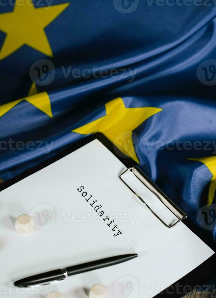 SOLIDARITY is written on the paper. photo
