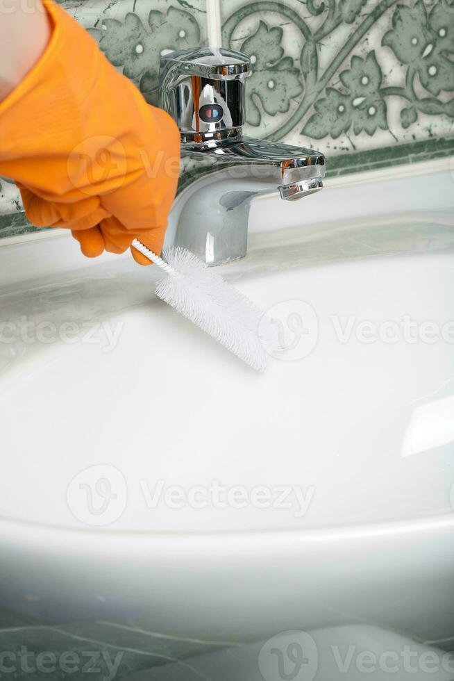 Bathroom cleaning. Closeup photo