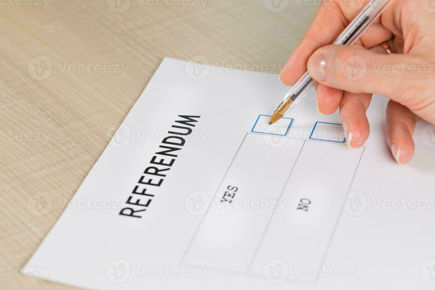 Referendum ballot paper, black pen, and passport on the table. photo