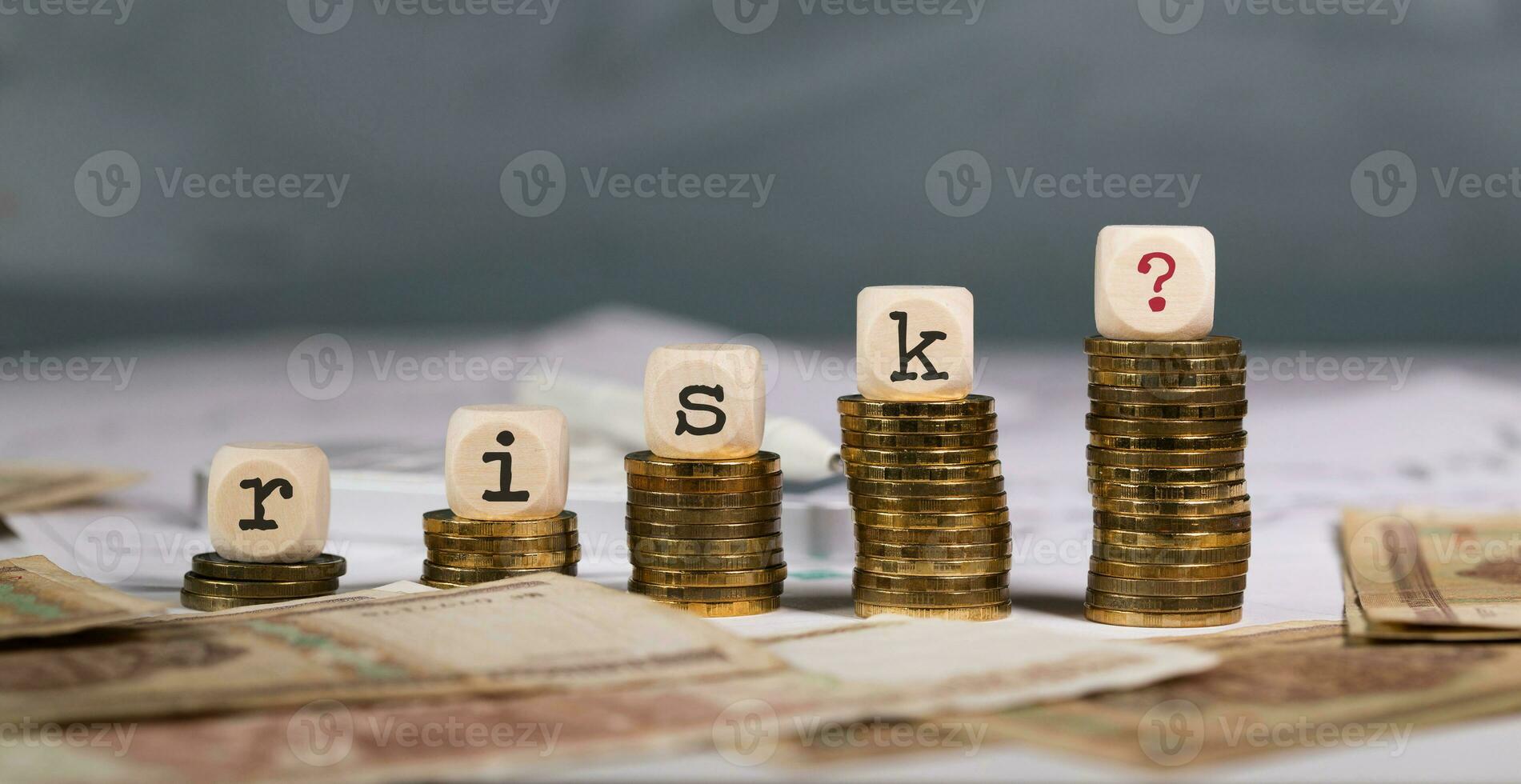 Word RISK composed of wooden letter. photo