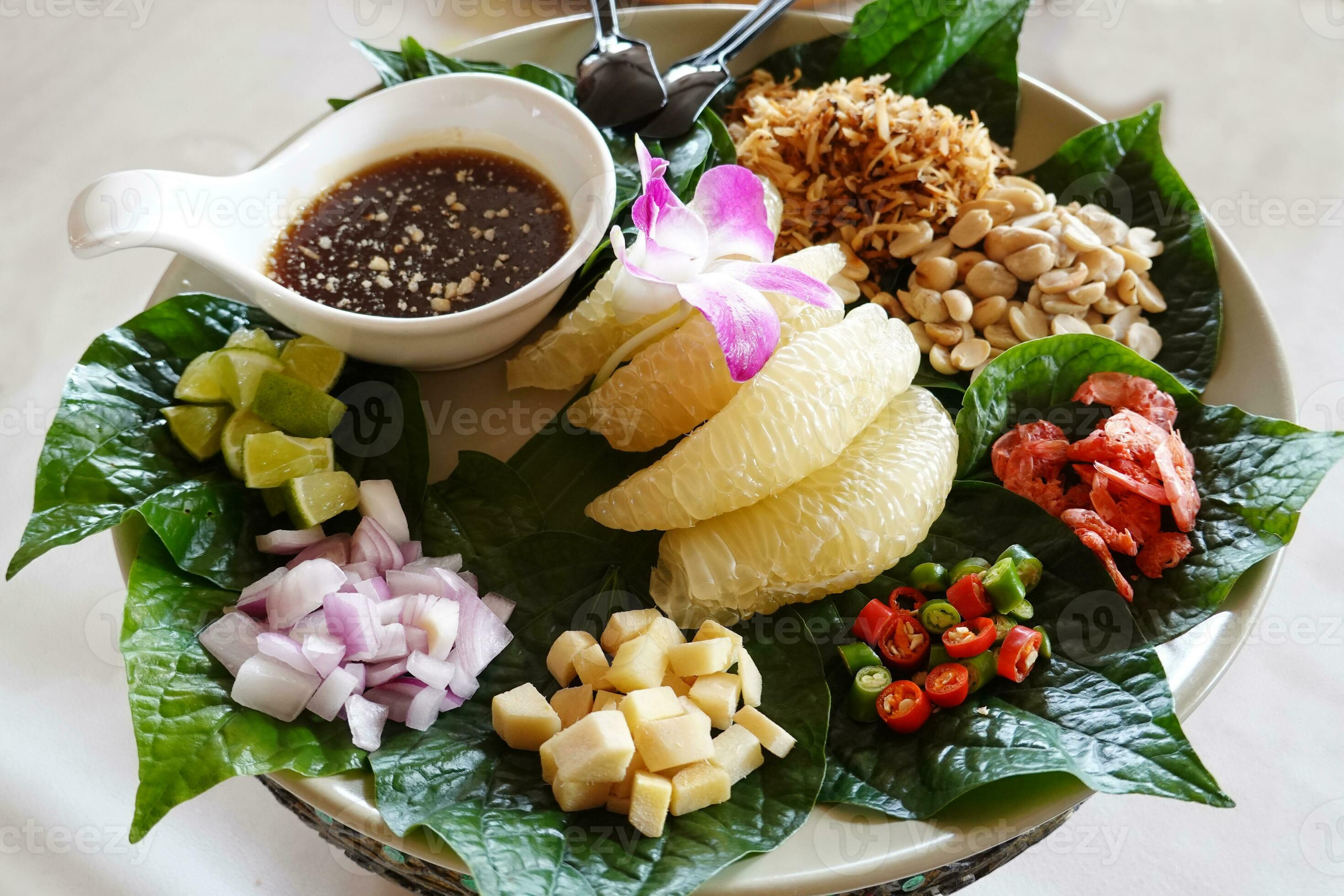 Miang kham A royal leaf wrap appetizer. Asian snack from Thailand 24992827 Stock Photo at Vecteezy
