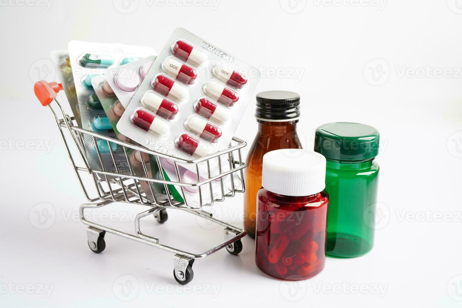 Shopping trolley with blister pill and capsule from drug prescription, pharmacy for treatment health medicine. photo