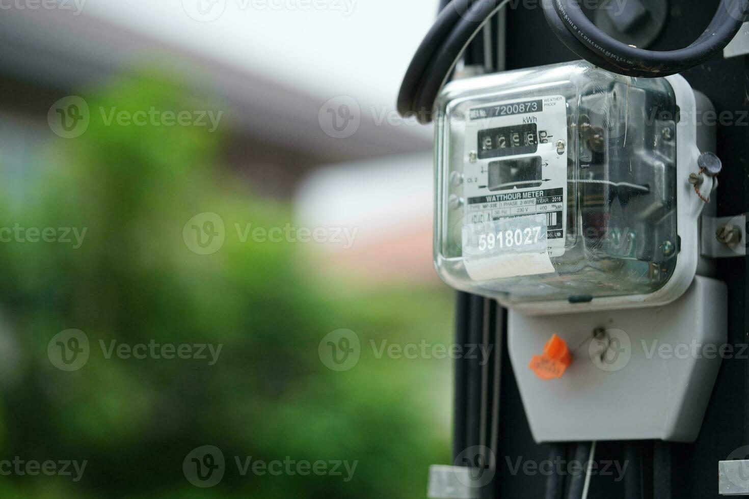 Bangkok, Thailand - May 15, 2022 Electric measuring power meter for energy cost at home and office. photo