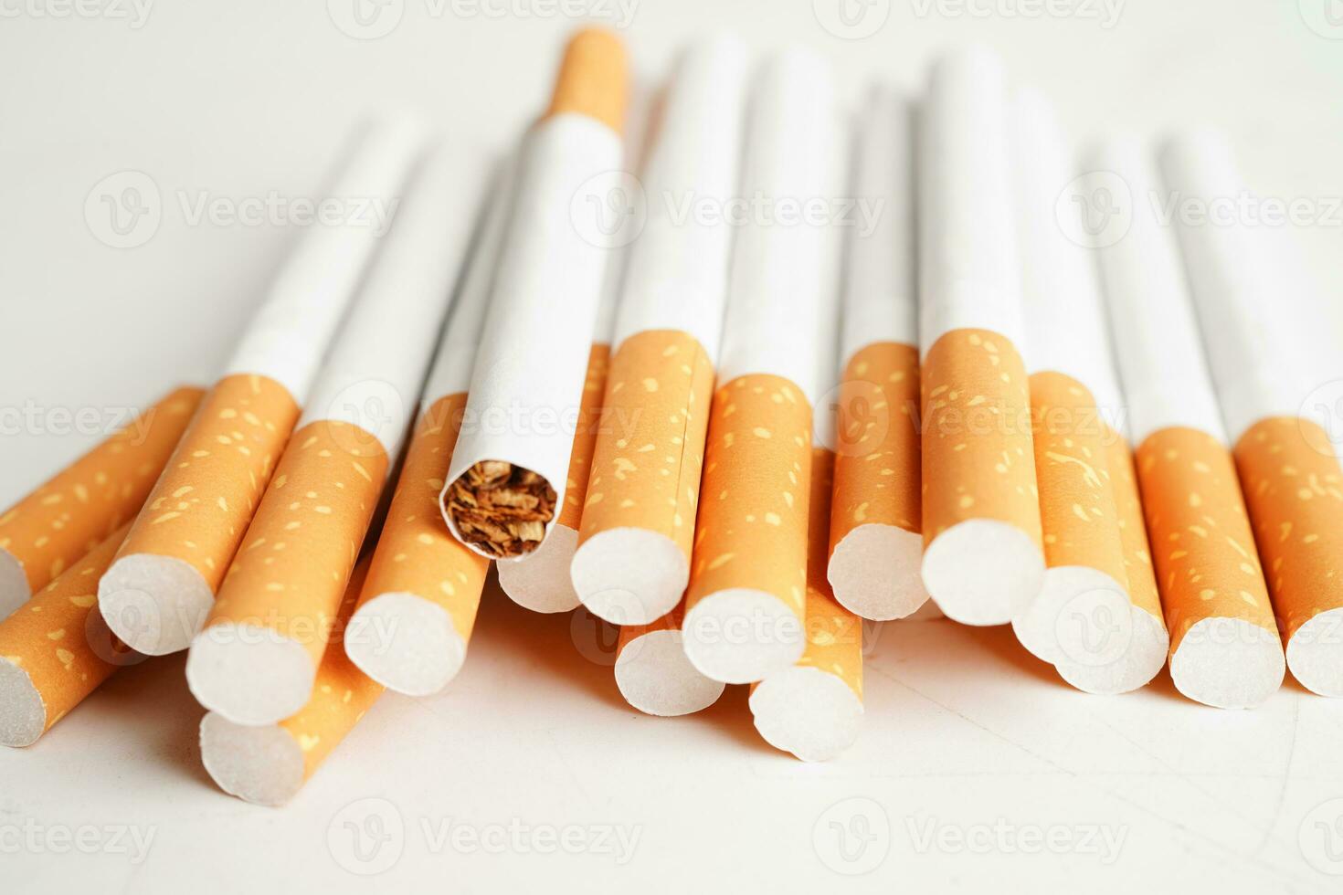Cigarette, roll tobacco in paper with filter tube, No smoking concept. photo