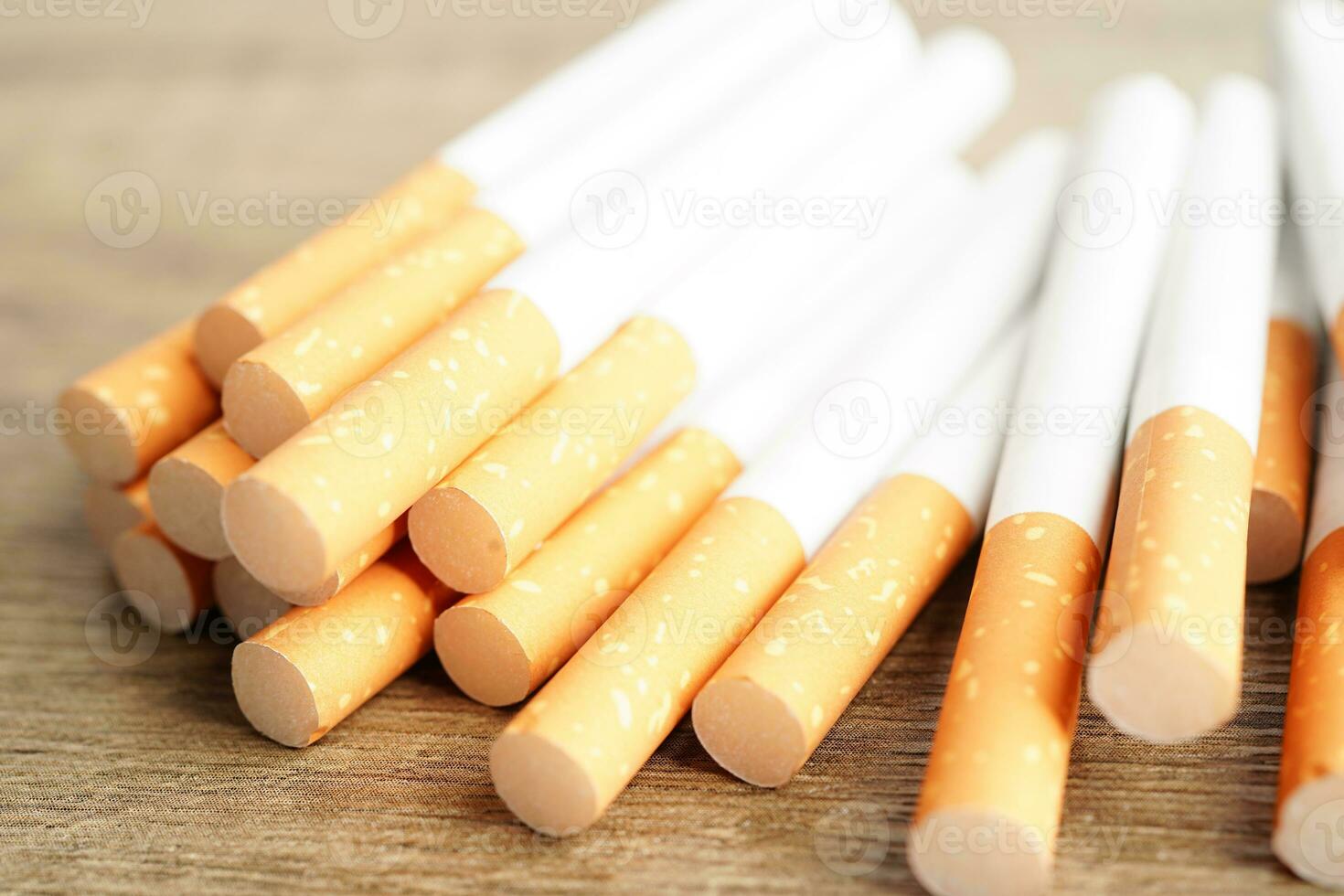 Cigarette, roll tobacco in paper with filter tube, No smoking concept. photo