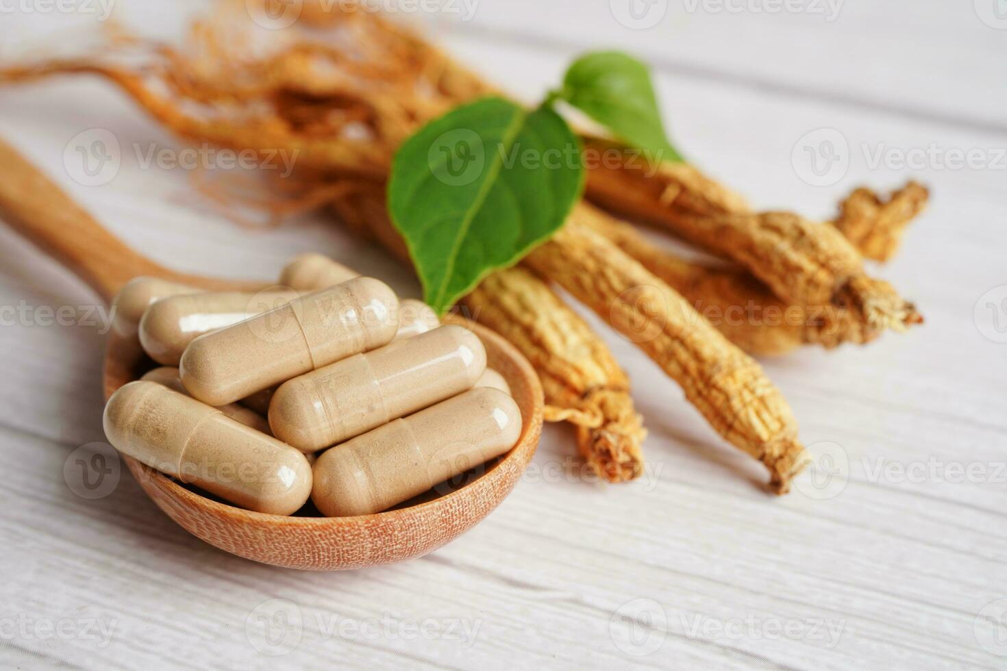 Ginseng roots and green leaf, healthy food. photo