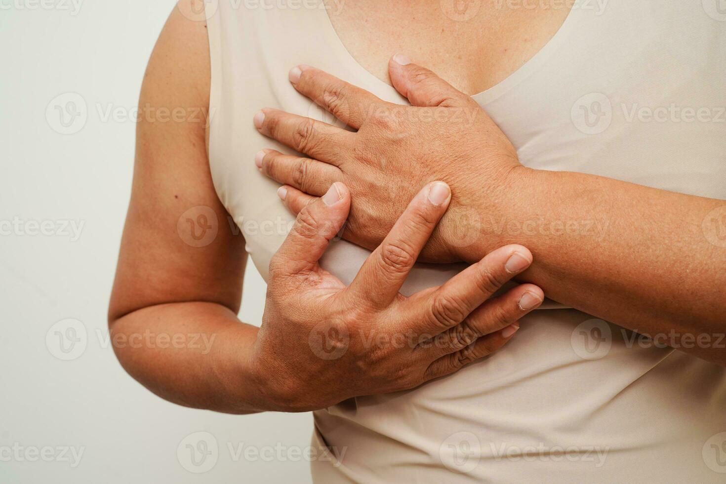 Asian woman self touching check lump or Breast cancer, Breast Self Exam. photo