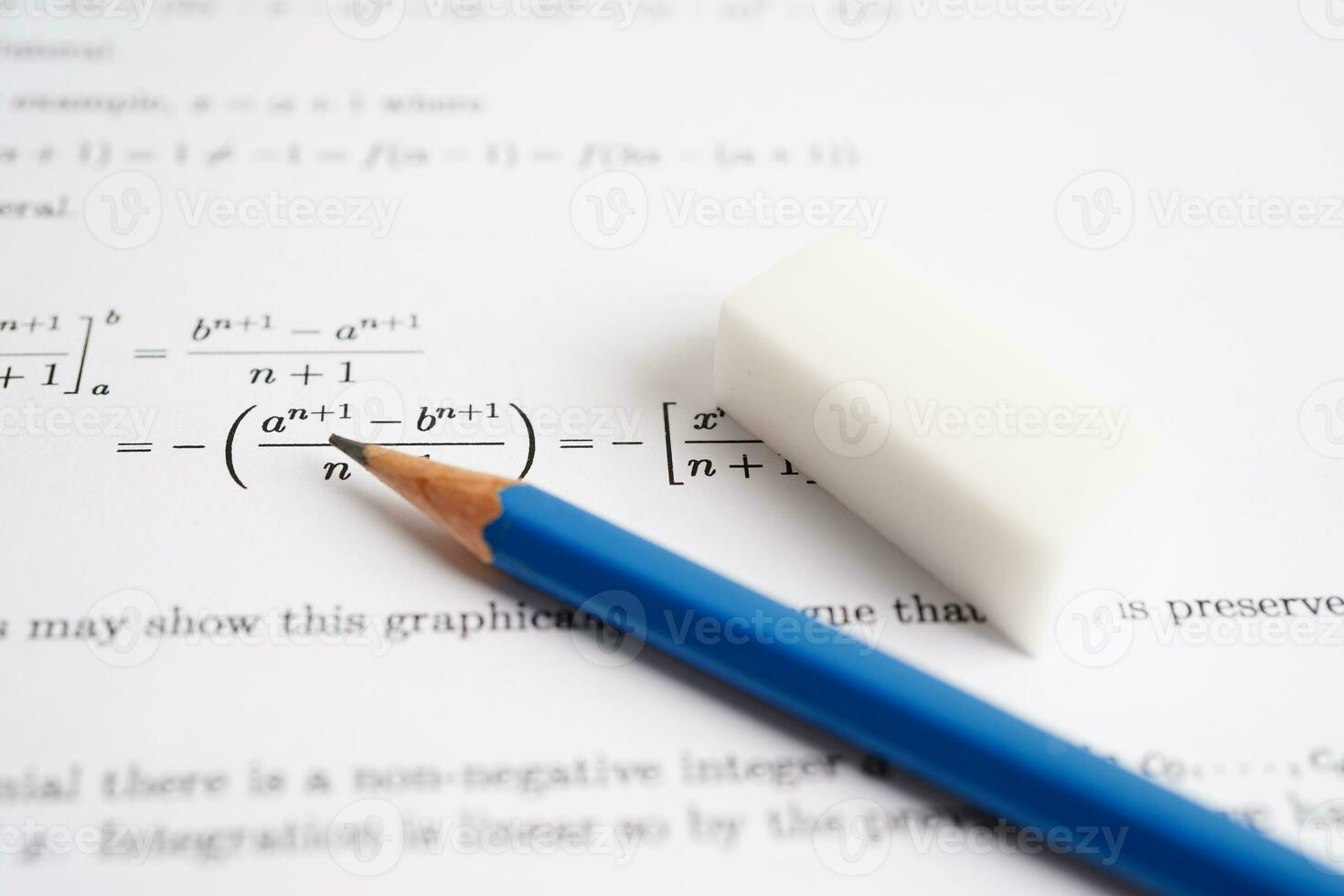 Pencil on mathematic formula exercise test paper in education school. photo