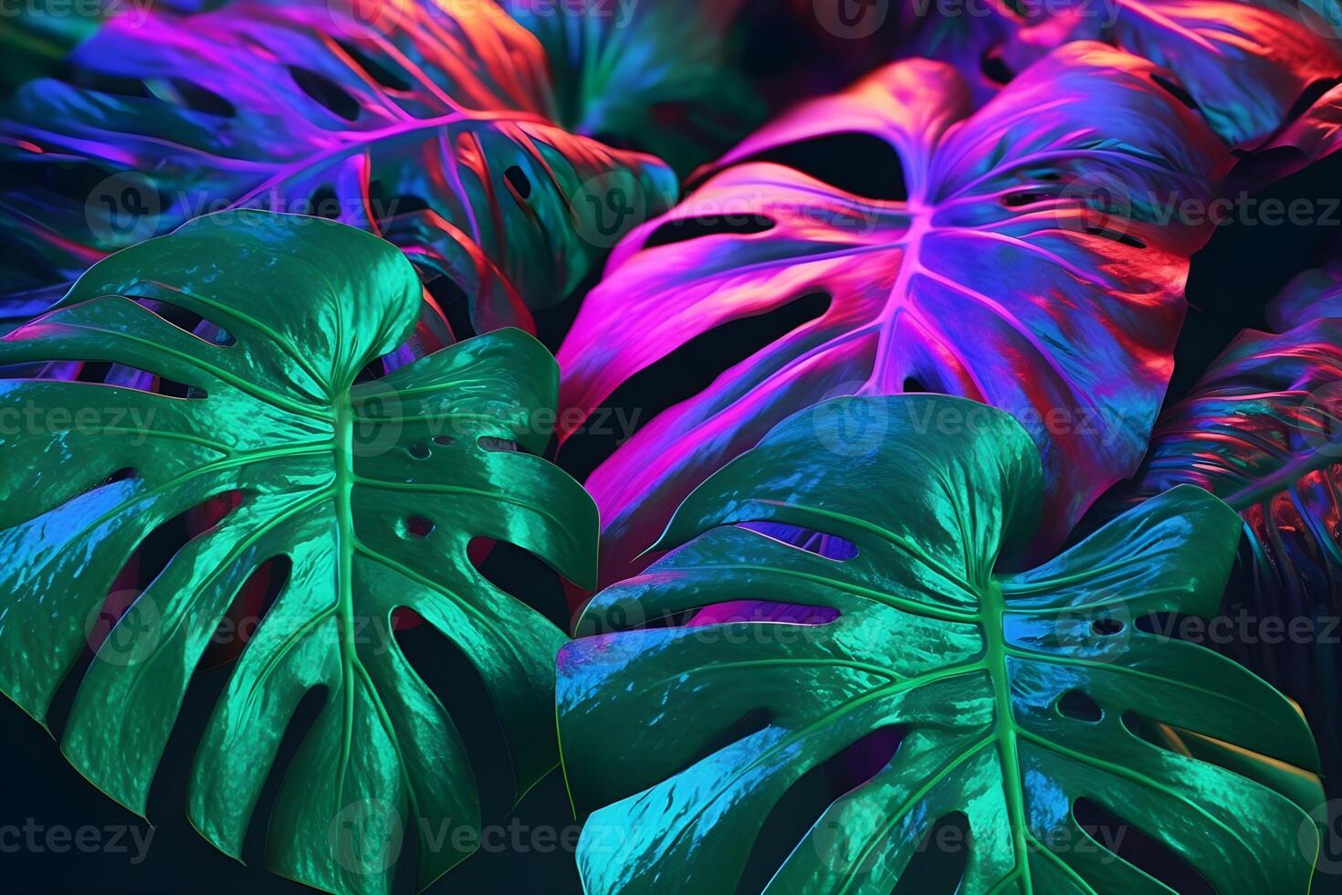Creative fluorescent color layout made of tropical leaves. Glowing neon