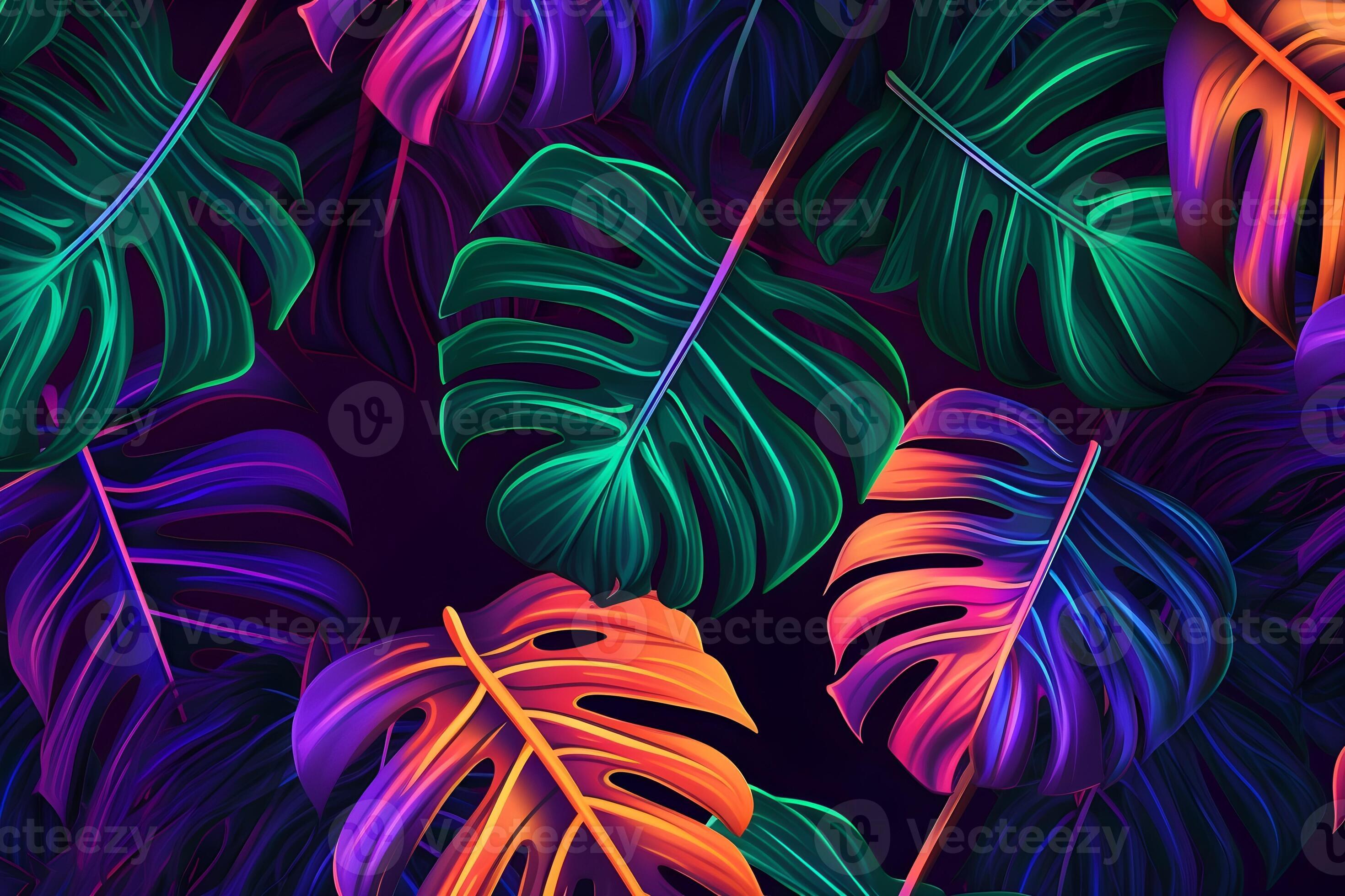 Creative fluorescent color layout made of tropical leaves. Glowing neon