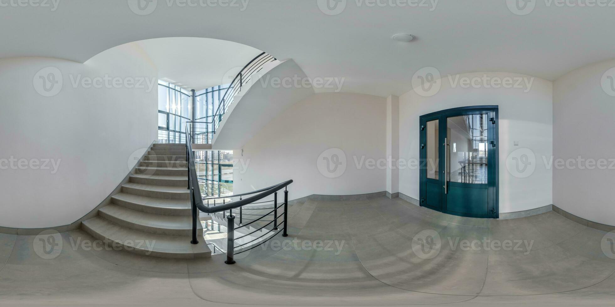 full hdri 360 panorama view in empty hall near emergency and evacuation exit stair in up ladder in new office building in equirectangular spherical projection, ready for AR VR content photo