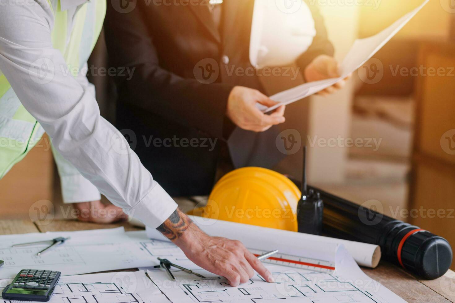 Professional Mechanical Engineer team Working on Personal Computer at Metal lathe industrial manufacturing factory. Engineer Operating lathe Machinery. Product quality Inspection photo