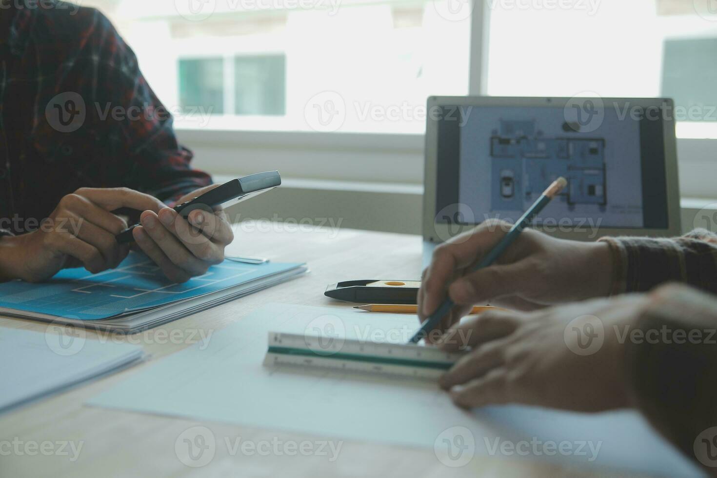 Professional Mechanical Engineer team Working on Personal Computer at Metal lathe industrial manufacturing factory. Engineer Operating lathe Machinery. Product quality Inspection photo