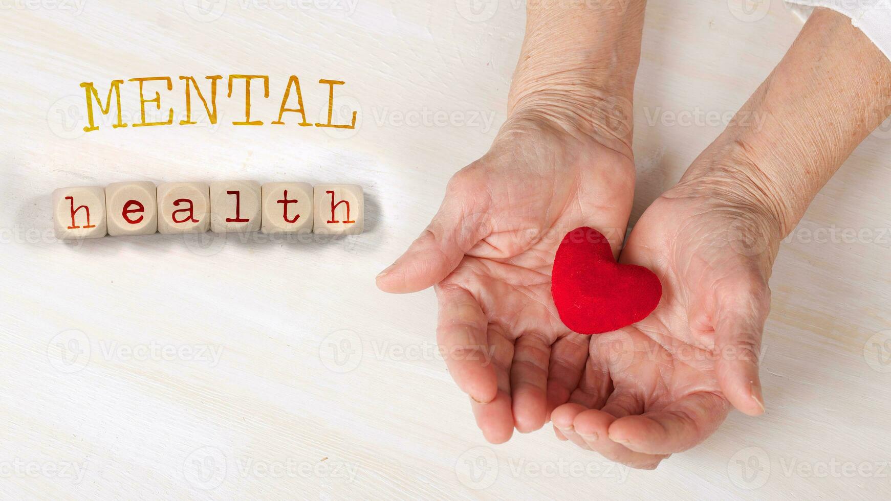 Words MENTAL HEALTH composed of wooden dices. photo