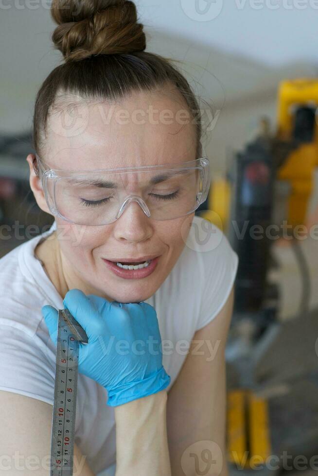 Young lady deals with wooden plinth photo