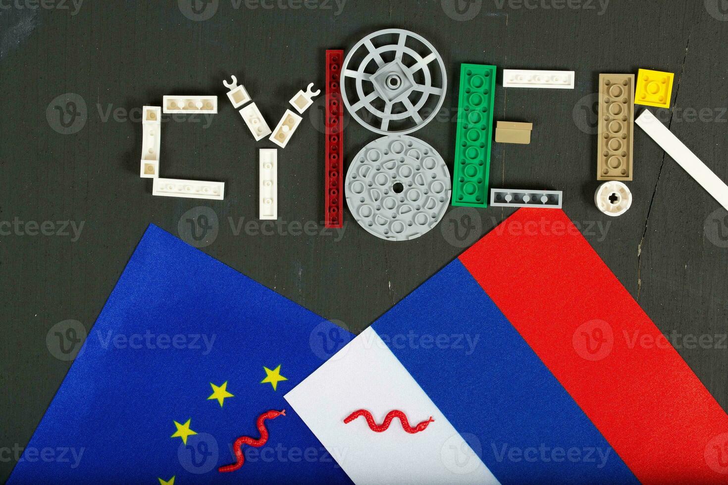 Cyber attack is composed of plastic mini block on a black surface.Background photo