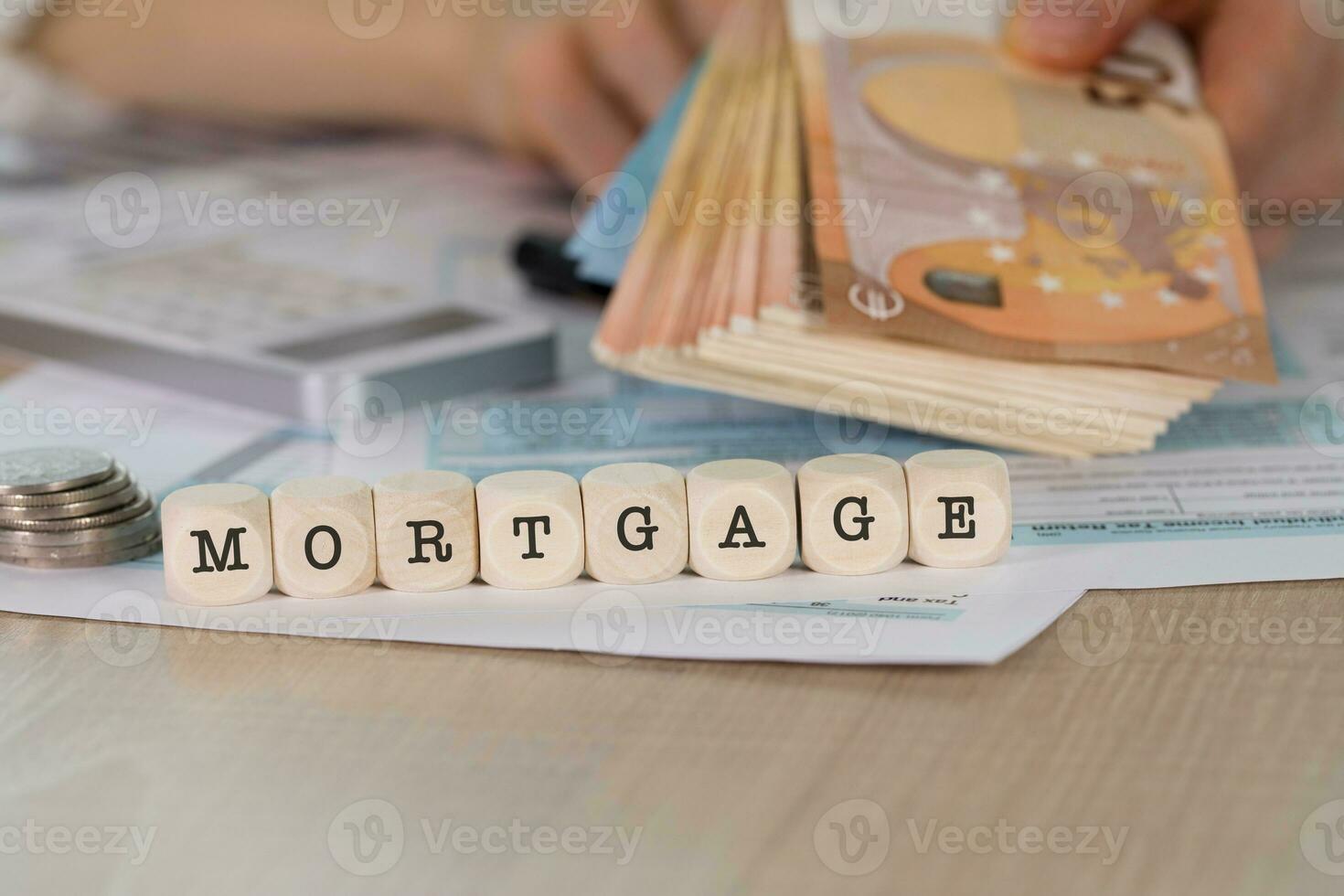 Word MORTGAGE composed of wooden letters. photo