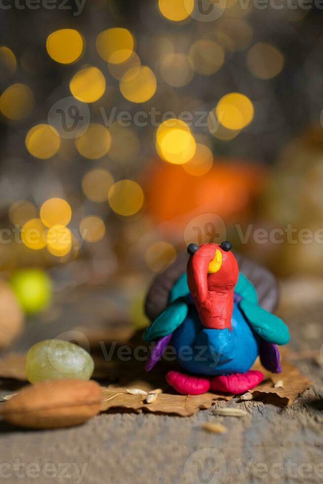 Handmade turkey on Thanksgiving background with blurred night lights. photo