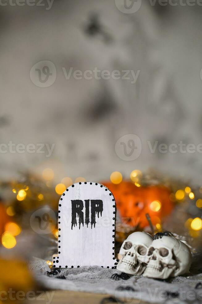 Grave and two skulls. Closeup photo