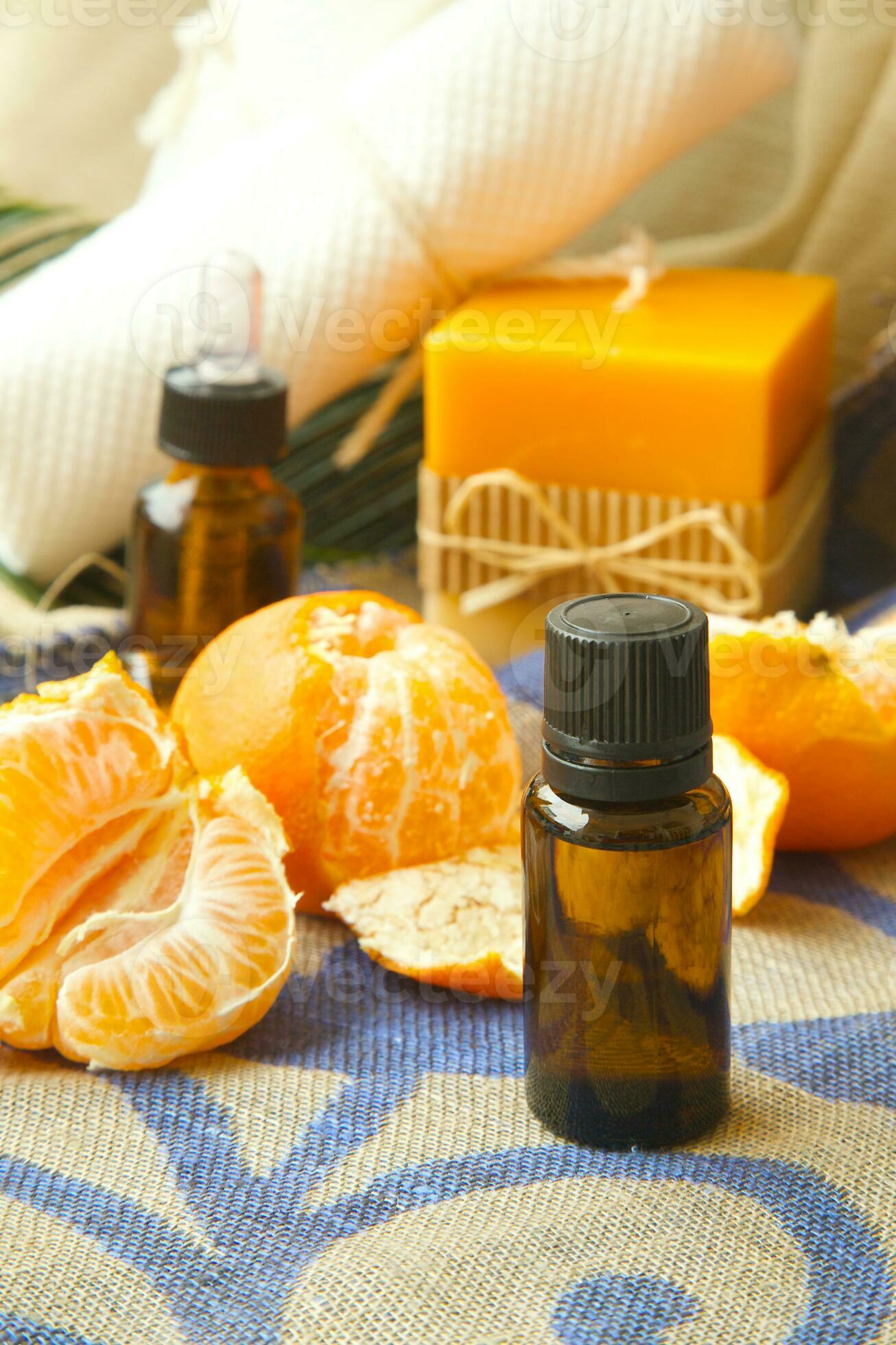 Mandarin essential oil 24996975 Stock Photo at Vecteezy