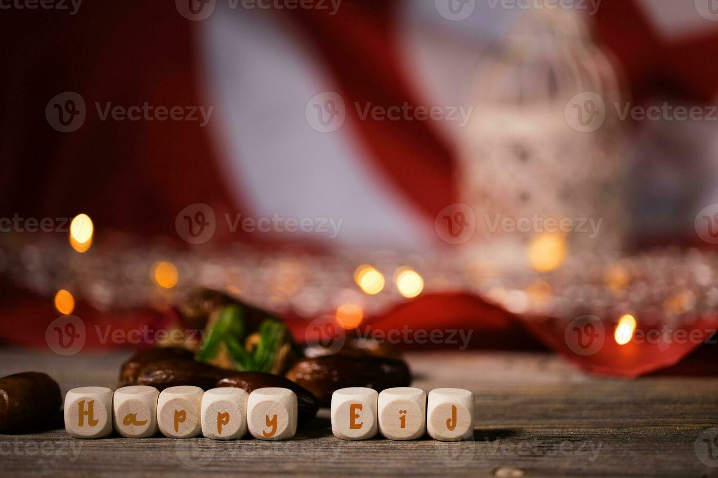 Words HAPPY EID composed of wooden dices photo