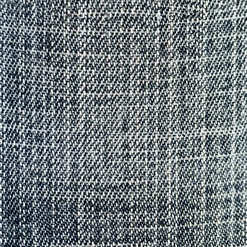 jeans denim Textured fabric background. denim jeans textile close up detail texture for background no people. ethnic textile background. abstract photography. photo