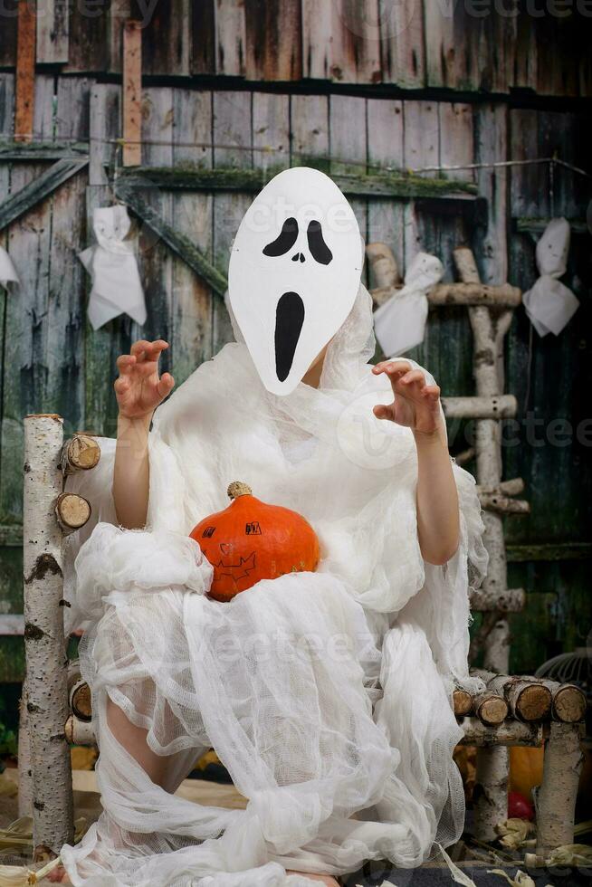 Boy of six years dressed in mummy costume. photo