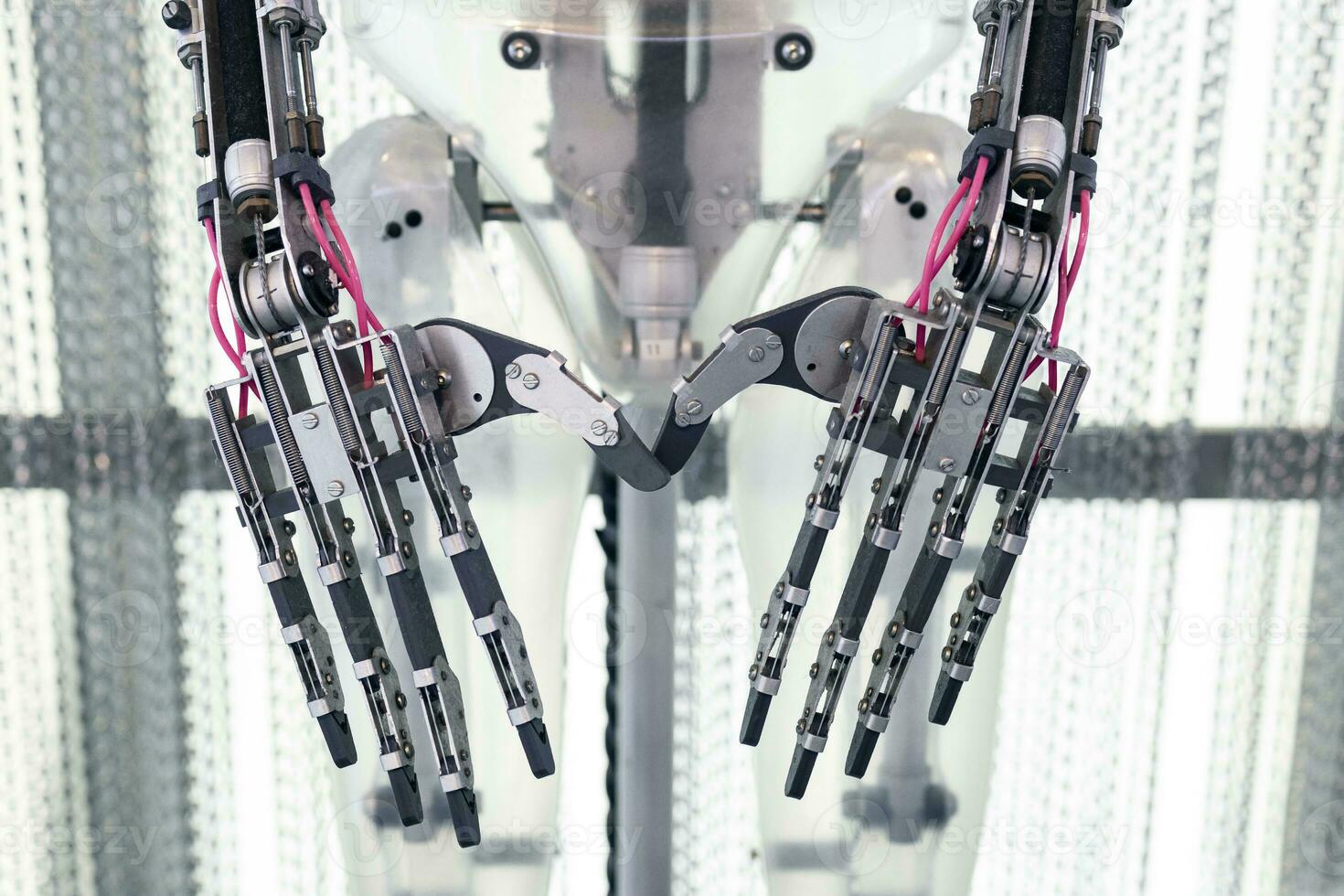 Five fingered robot arm and hands close up. Robotic technology photo