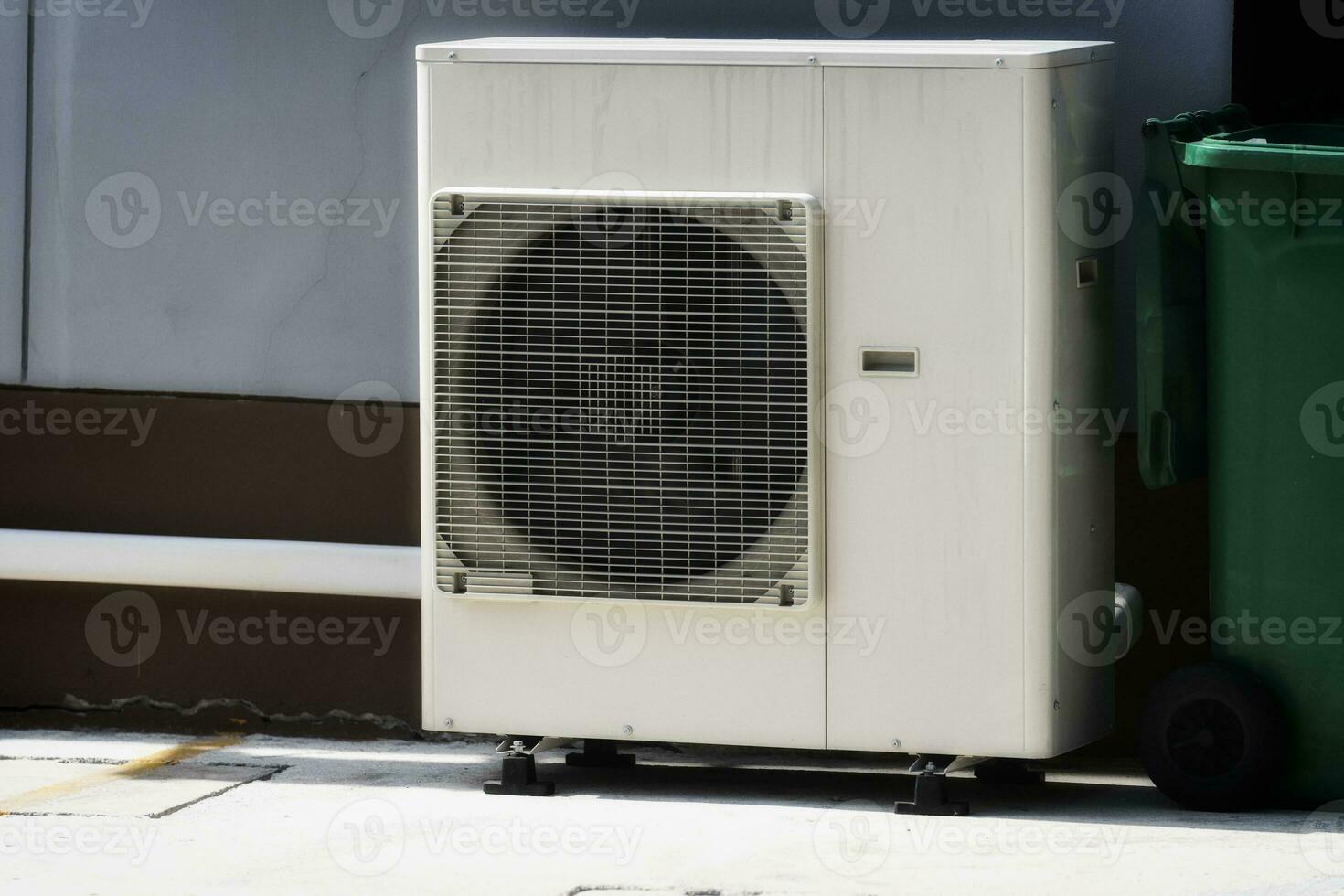 Air conditioner on the roof of a building in the city. photo