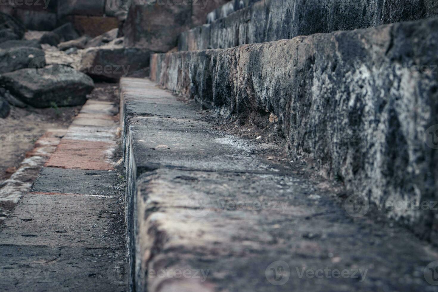 Ruins of an ancient Christian temple stairway close up photo. photo