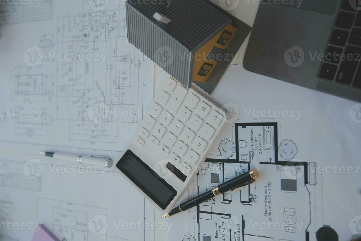 Engineer Teamwork Meeting, Drawing working on blueprint meeting for project working with partner on model building and engineering tools in working site, Construction and structure concept. photo