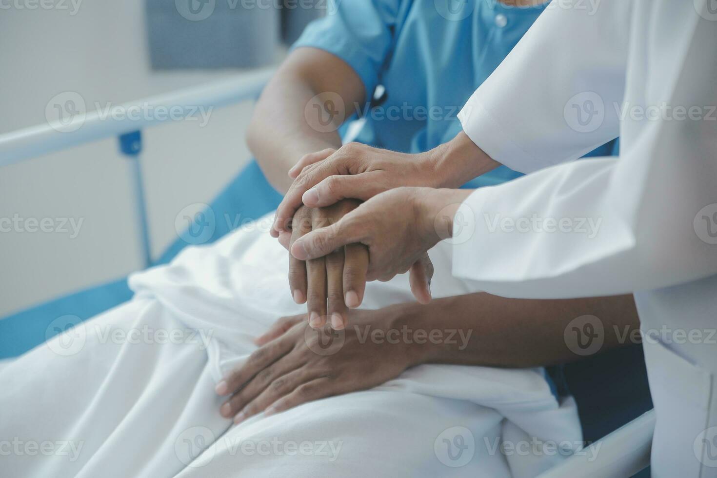 Doctor and patient discussing current health examination while sitting at the desk in clinic office, closeup. Medicine concept. photo